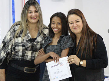 Diretoria do Mutirão e jovem.